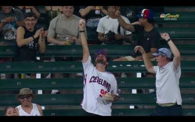 Fan makes a SPECTACULAR CATCH while HOLDING NACHOS!