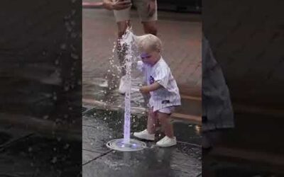 Kid vs. fountain. See who wins! 🤣