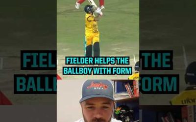 Fielder teaches ball boy how to catch