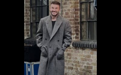 A very precious David Beckham behind the scenes of his Netflix Queue cover shoot